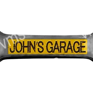 A yellow and black sign reading 'JOHN'S GARAGE'.