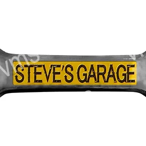 A yellow and black bone-shaped sign reading 'Steve's Garage'.