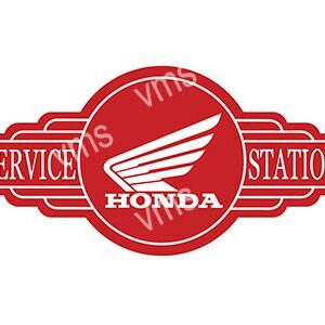 Vintage red Honda service station logo with wing emblem.
