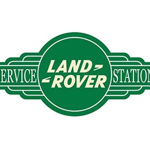 Vintage Land Rover service station logo in green and white.
